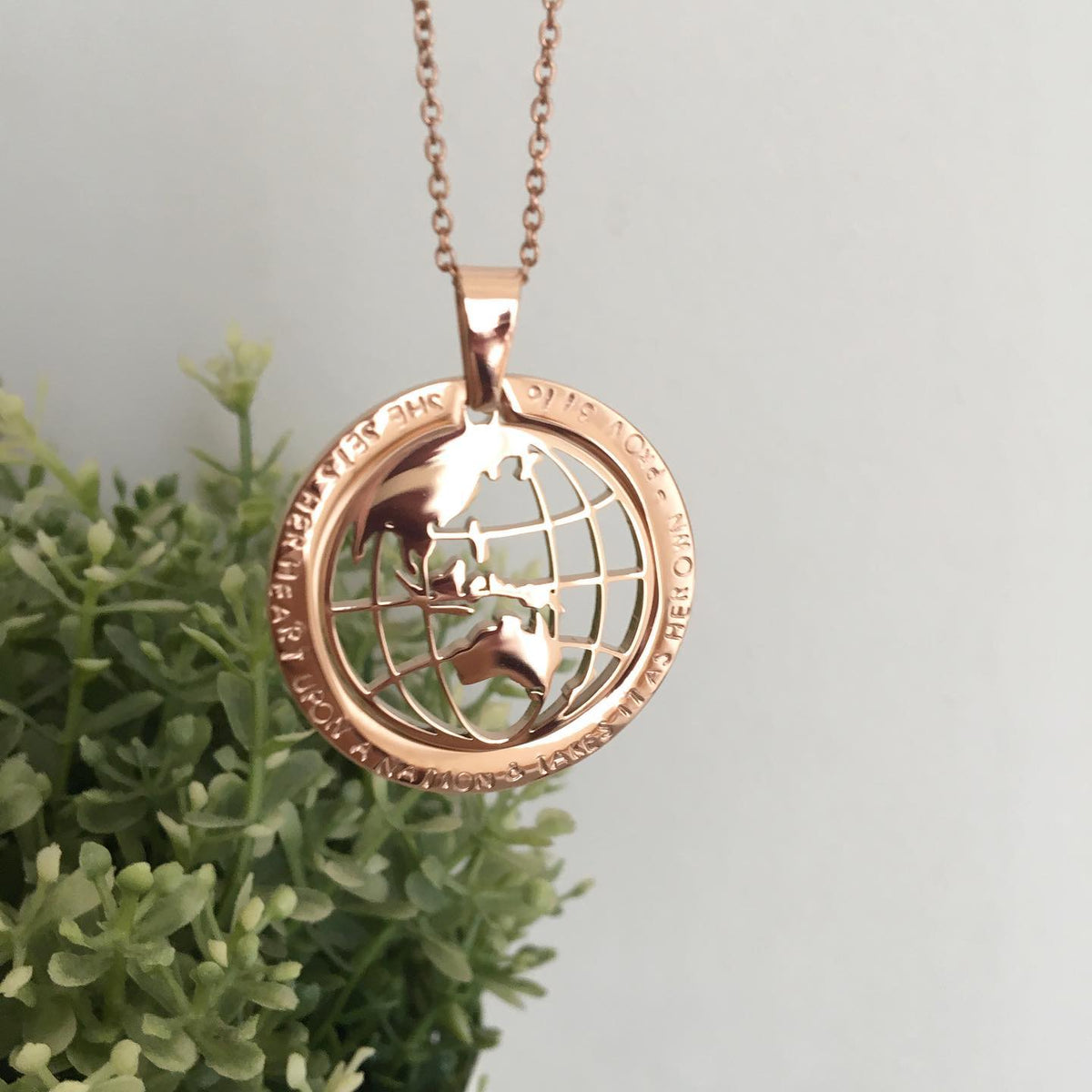 Gold globe pendant deals necklace